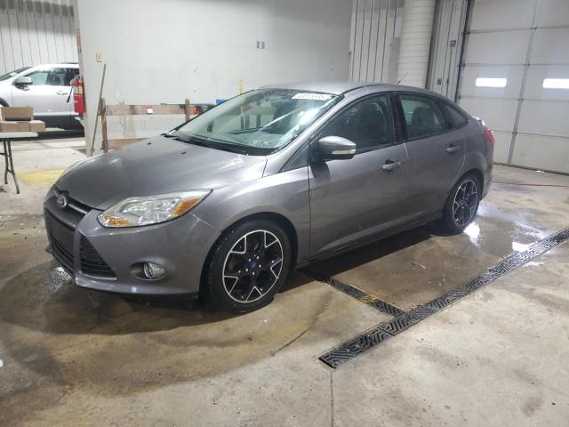 FORD FOCUS SE 2014 with VIN 1FADP3F24EL415759 - Photo from auction