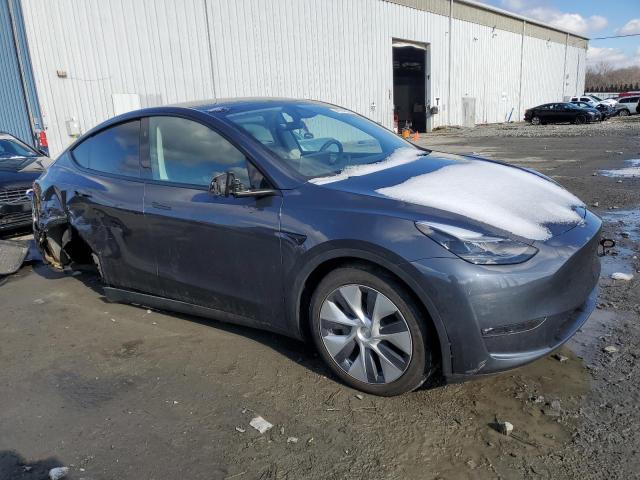 Снимка 4 от търг – 2023 TESLA MODEL Y с VIN 7SAYGDEE1PF842242