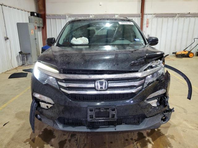 Photo 5 from auction – 2018 HONDA PILOT ELIT with VIN 5FNYF6H09JB007458