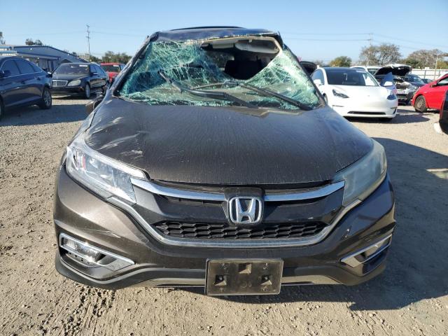 Photo 5 from auction – 2016 HONDA CR-V EX with VIN 2HKRM4H50GH666923