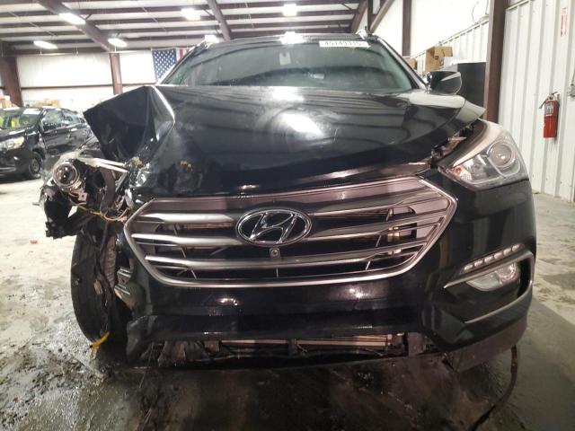 Photo 5 from auction – 2018 HYUNDAI SANTA FE S with VIN 5NMZU3LB1JH078346