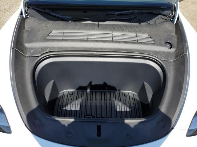 Photo 11 from auction – 2023 TESLA MODEL Y with VIN 7SAYGAEE6PF614509