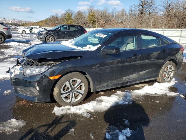 HONDA CIVIC LX 2017 with VIN 2HGFC2F50HH574168 - Photo from auction