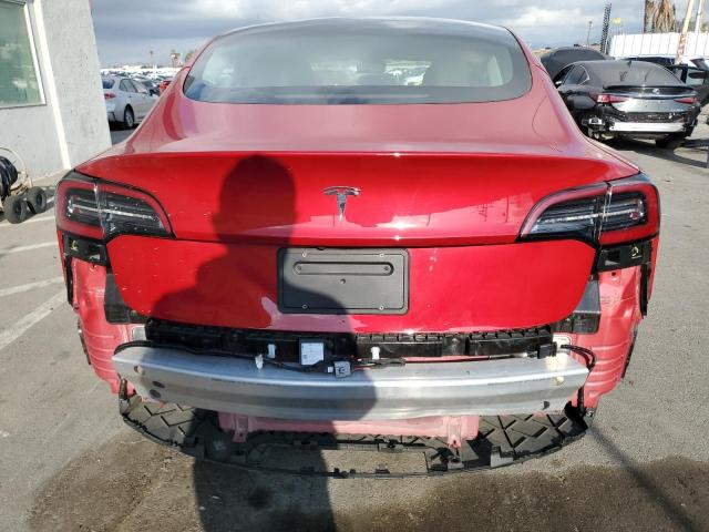 Снимка 6 от търг – 2021 TESLA MODEL 3 с VIN 5YJ3E1EAXMF054094