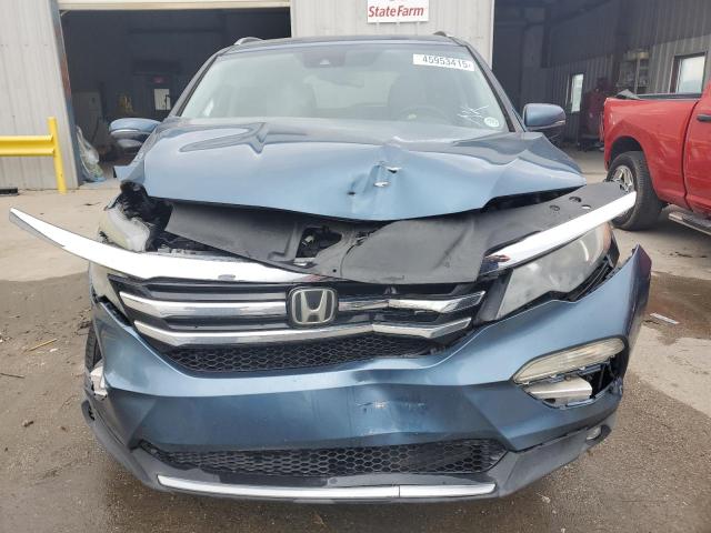 Photo 5 from auction – 2016 HONDA PILOT TOUR with VIN 5FNYF5H95GB056612