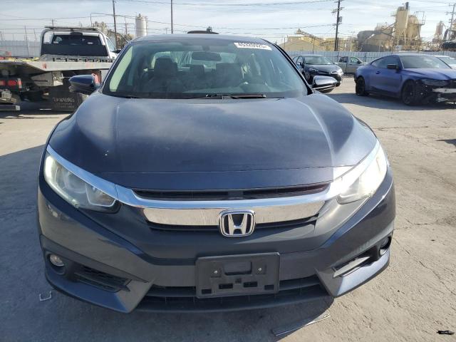 Photo 5 from auction – 2016 HONDA CIVIC EX with VIN 19XFC1F35GE224231