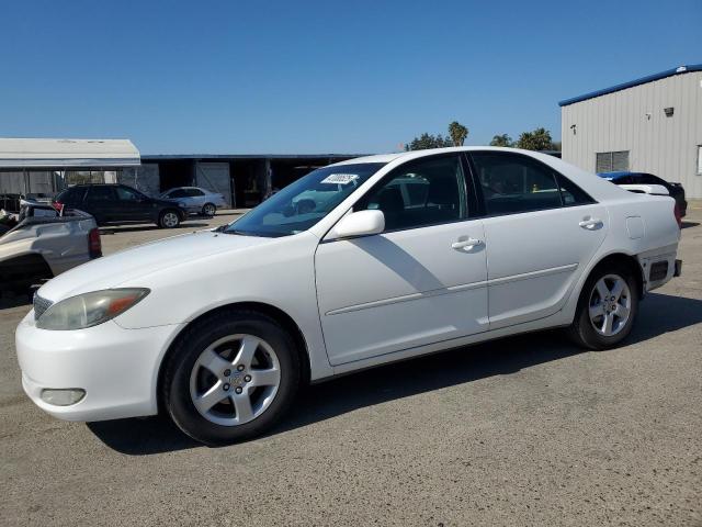 TOYOTA CAMRY LE 2004 with VIN 4T1BE32K44U276539 - Photo from auction