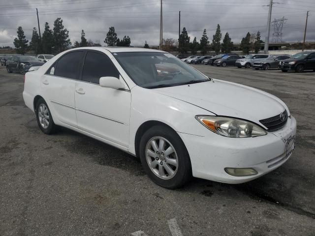 Photo 4 from auction – 2003 TOYOTA CAMRY LE with VIN JTDBF32KX30149382