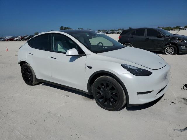 Снимка 4 от търг – 2023 TESLA MODEL Y с VIN 7SAYGAEE0PF906155