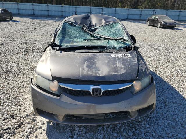 Photo 5 from auction – 2011 HONDA CIVIC LX with VIN 19XFA1F53BE016946