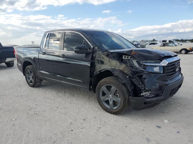 Photo 4 from auction – 2023 HONDA RIDGELINE with VIN 5FPYK3F57PB057879