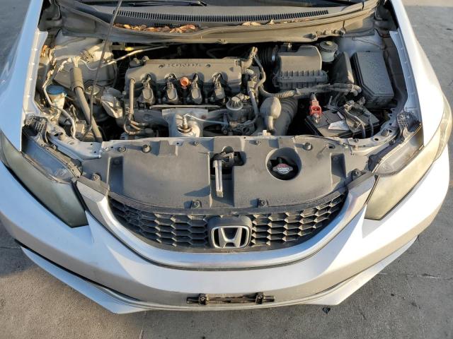 Photo 11 from auction – 2014 HONDA CIVIC LX with VIN 19XFB2F59EE020202