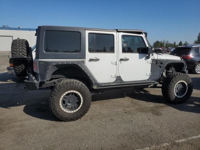 Photo 3 from auction – 2014 JEEP WRANGLER U with VIN 1C4BJWDG8EL179037