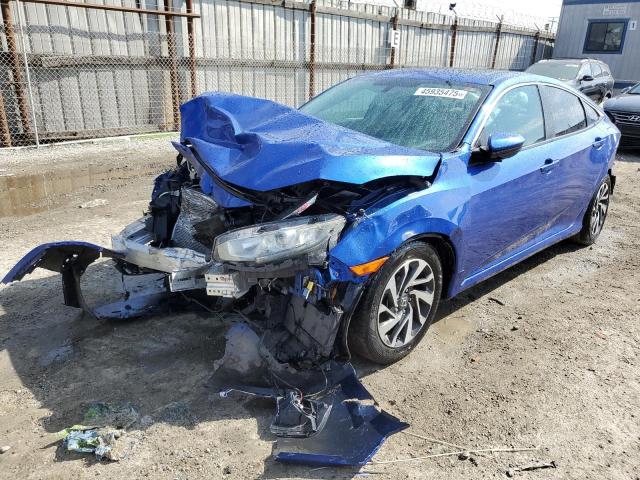 Photo 1 from auction – 2018 HONDA CIVIC EX with VIN 2HGFC2F77JH507199