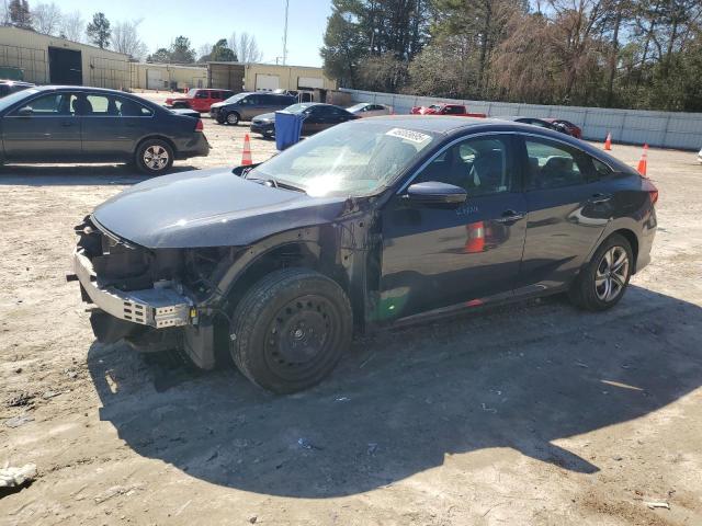 HONDA CIVIC LX 2018 with VIN 2HGFC2F57JH599686 - Photo from auction