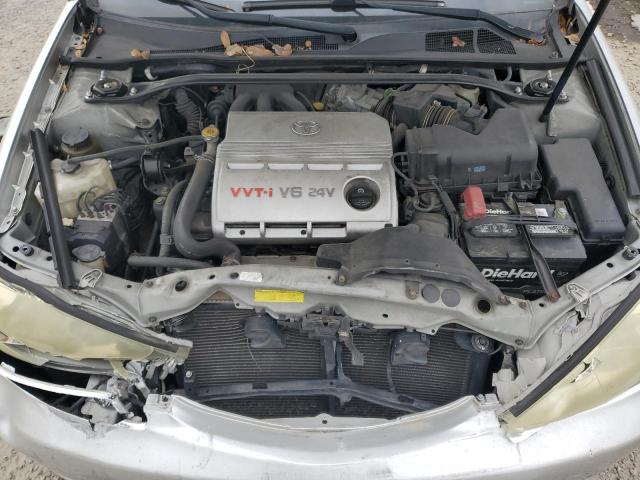 Photo 11 from auction – 2004 TOYOTA CAMRY LE with VIN 4T1BF30KX4U584542
