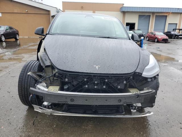 Photo 5 from auction – 2022 TESLA MODEL Y with VIN 7SAYGDEF3NF556737