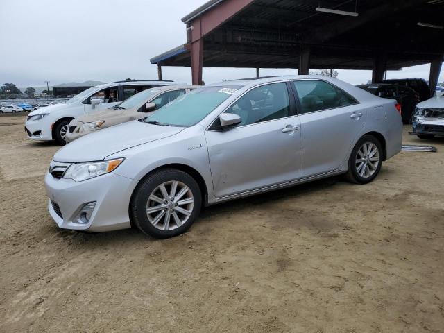 TOYOTA CAMRY HYBR 2013 with VIN 4T1BD1FK0DU091597 - Photo from auction