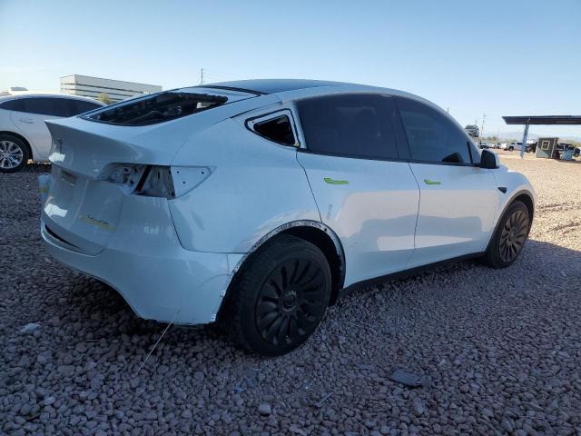 Снимка 3 от търг – 2023 TESLA MODEL Y с VIN 7SAYGDEE2PA140699