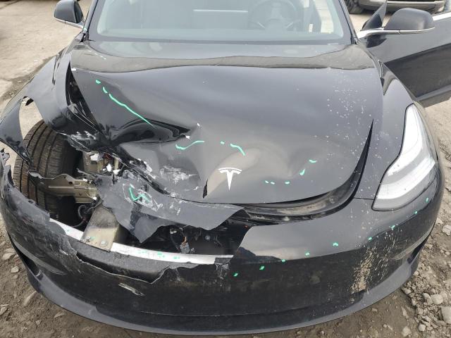 Photo 11 from auction – 2019 TESLA MODEL 3 with VIN 5YJ3E1EA2KF296634