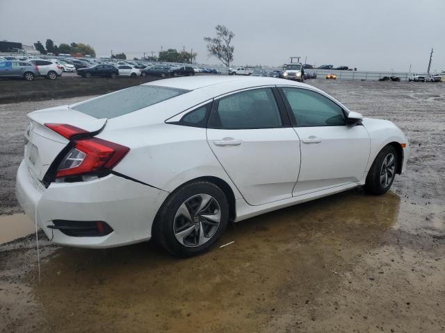 Photo 3 from auction – 2021 HONDA CIVIC LX with VIN 2HGFC2F63MH533200