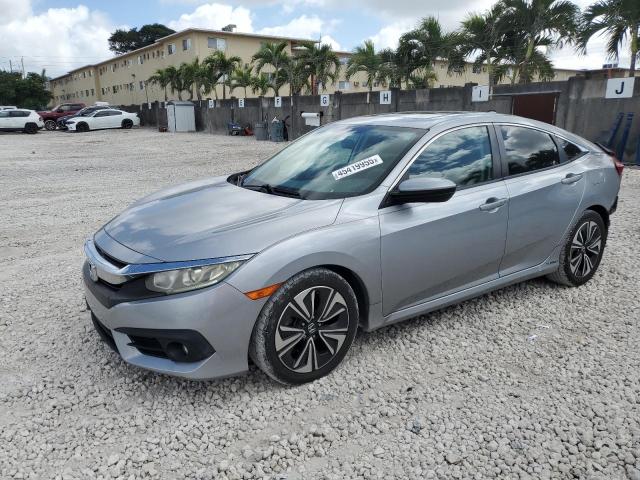HONDA CIVIC EX 2016 with VIN 19XFC1F35GE038110 - Photo from auction