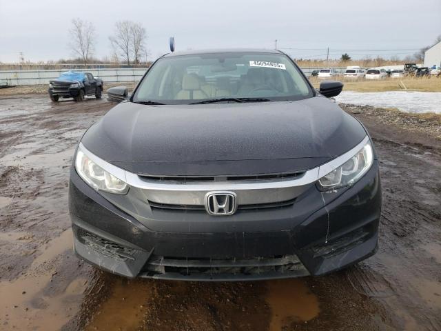 Photo 5 from auction – 2018 HONDA CIVIC EX with VIN 2HGFC2F73JH591280