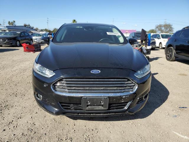 Photo 5 from auction – 2016 FORD FUSION TIT with VIN 3FA6P0SU5GR173230