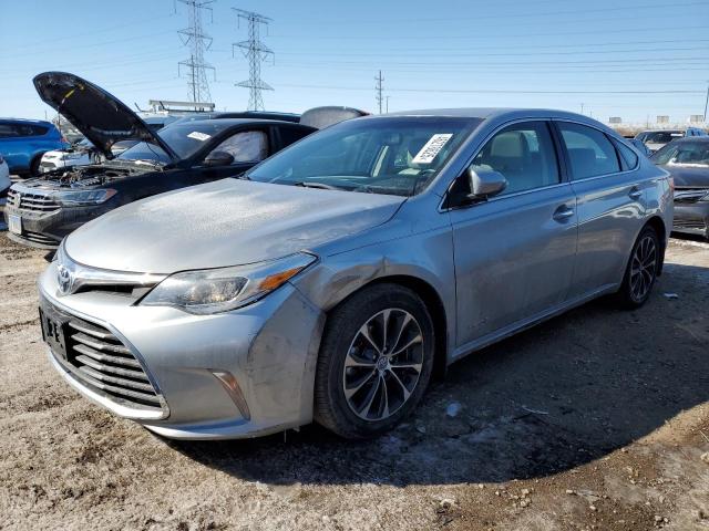 TOYOTA AVALON HYB 2016 with VIN 4T1BD1EB1GU051079 - Photo from auction