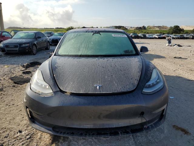 Photo 5 from auction – 2018 TESLA MODEL 3 with VIN 5YJ3E1EBXJF083244