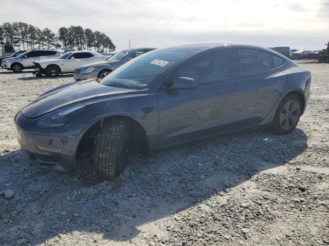TESLA MODEL 3 2023 with VIN 5YJ3E1EA5PF515450 - Photo from auction