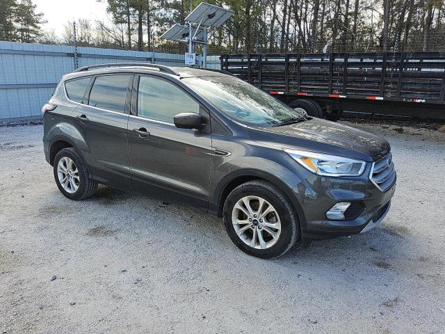Снимка 4 от търг – 2018 FORD ESCAPE SE с VIN 1FMCU9GD2JUB23481