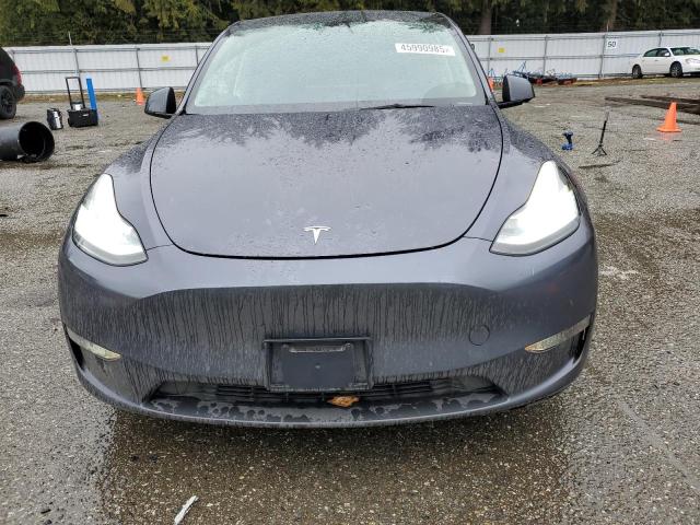 Photo 5 from auction – 2022 TESLA MODEL Y with VIN 7SAYGAEE6NF315289