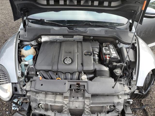 Photo 11 from auction – 2013 VOLKSWAGEN BEETLE with VIN 3VWJP7AT9DM613946