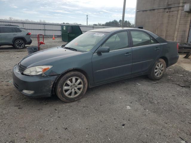 TOYOTA CAMRY LE 2004 with VIN 4T1BF30K44U077524 - Photo from auction