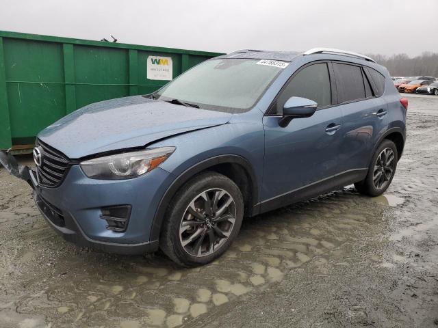 MAZDA CX-5 GT 2016 with VIN JM3KE4DY3G0893915 - Photo from auction