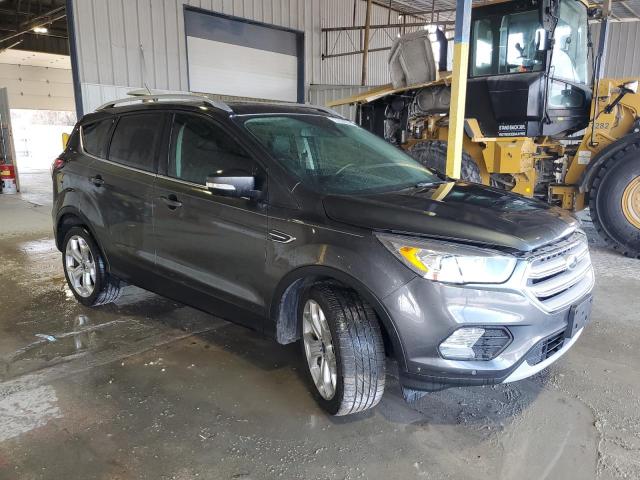 Photo 4 from auction – 2018 FORD ESCAPE TIT with VIN 1FMCU0J90JUD58851