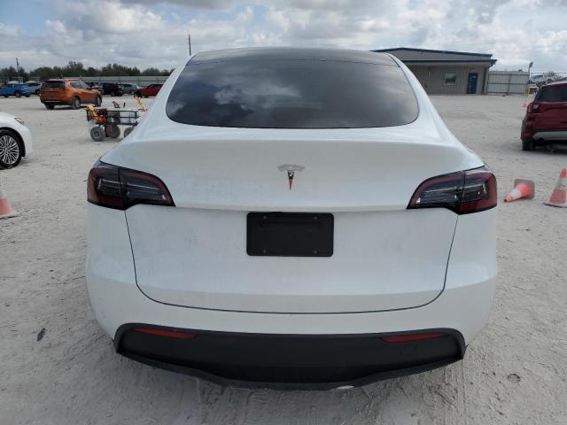 Снимка 6 от търг – 2024 TESLA MODEL Y с VIN 7SAYGDED0RF158471