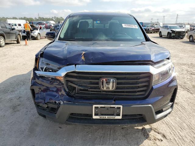 Photo 5 from auction – 2023 HONDA RIDGELINE with VIN 5FPYK3F51PB012274