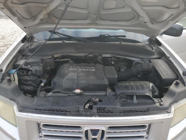 Photo 11 from auction – 2006 HONDA RIDGELINE with VIN 2HJYK16276H567883