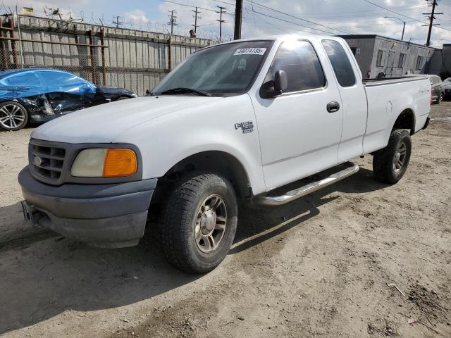 FORD F-150 HERI 2004 with VIN 2FTRX18W64CA73552 - Photo from auction