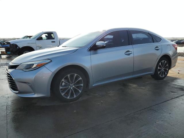 TOYOTA AVALON HYB 2016 with VIN 4T1BD1EB9GU050617 - Photo from auction