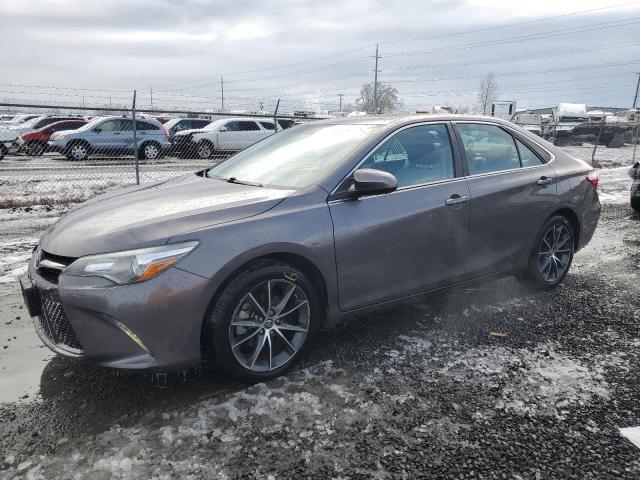 TOYOTA CAMRY LE 2015 with VIN 4T1BF1FK8FU110183 - Photo from auction