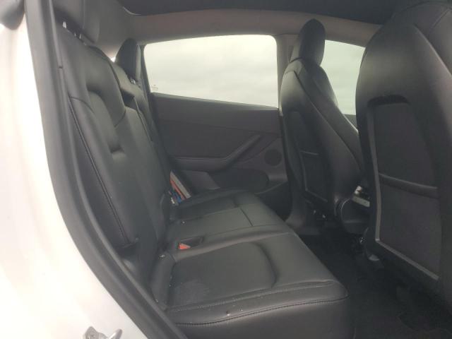 Photo 11 from auction – 2021 TESLA MODEL Y with VIN 5YJYGDEE5MF100032
