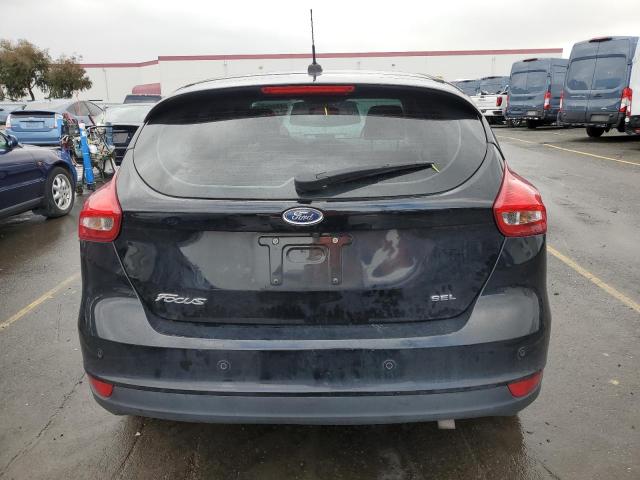 Photo 6 from auction – 2018 FORD FOCUS SEL with VIN 1FADP3M20JL244182