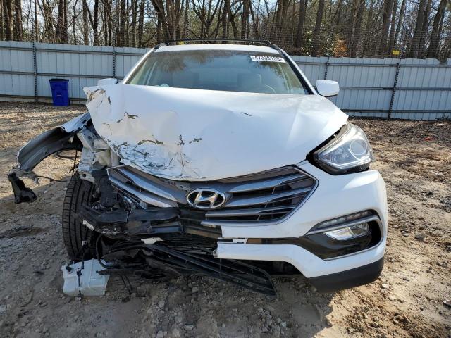 Снимка 5 от търг – 2017 HYUNDAI SANTA FE S с VIN 5NMZU3LB2HH010650
