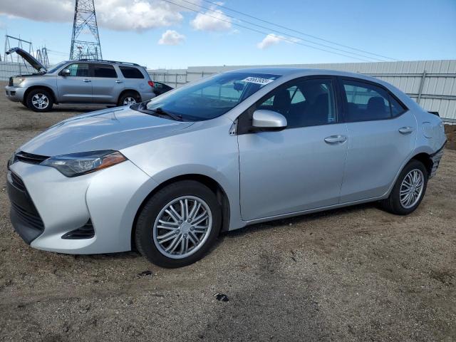 TOYOTA COROLLA L 2017 with VIN 5YFBURHE6HP731745 - Photo from auction