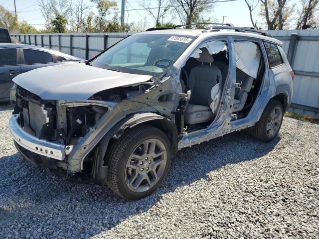 HONDA PASSPORT E 2023 with VIN 5FNYF8H54PB040111 - Photo from auction