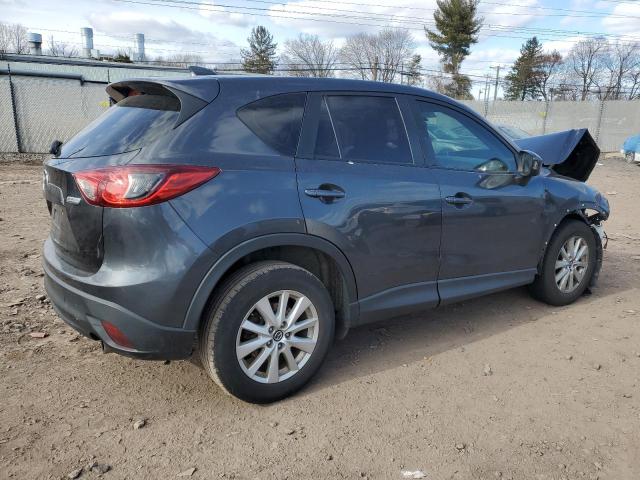 Photo 3 from auction – 2014 MAZDA CX-5 SPORT with VIN JM3KE2BE3E0378715