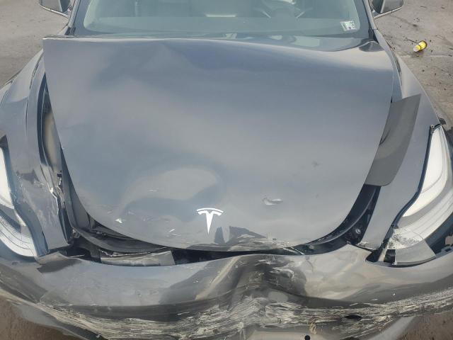 Photo 11 from auction – 2018 TESLA MODEL 3 with VIN 5YJ3E1EB0JF054836